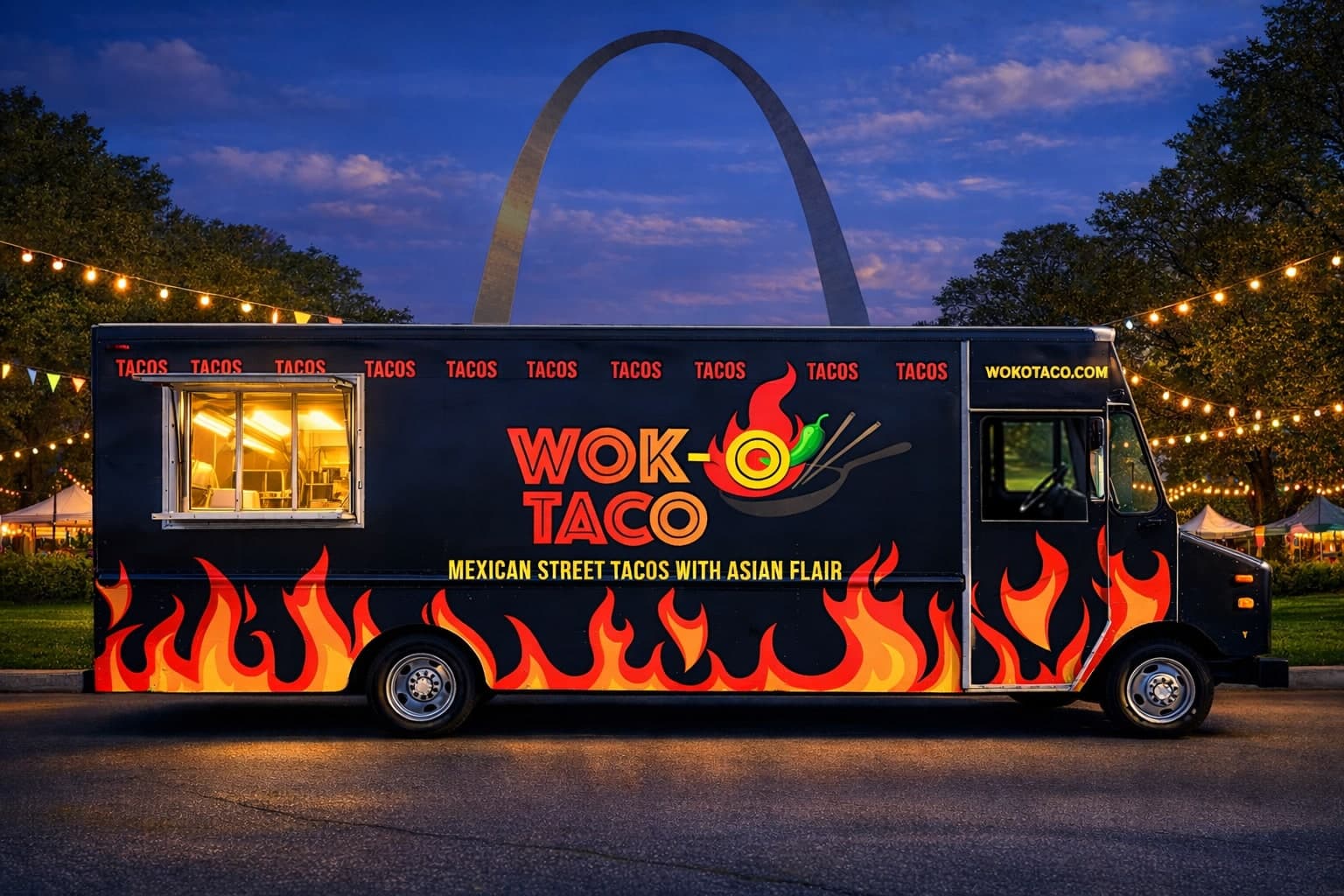 Wok-O Taco truck at night under the Gateway Arch with string lights, service window open and glowing